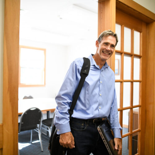 Man leaving Conference Room
